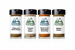 All Purpose Gift Set with Wilderness Garlic Pepper, Trailside Salt and Pepper Seasoning, Ranch Creek All-purpose Seasoning, Italian Herbs (Salt-Free) jars side by side