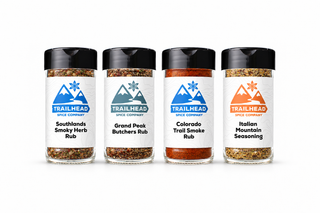 Colorado Trails Gift Set with Southlands Smoky Herb Rub, Grand Peak Butchers Rub, Colorado Trail Smoke Rub, Italian Mountain Seasoning jars side by side