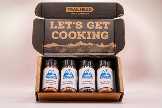 Grill Master Gift Set in an open gift box with four barbecue seasoning jars