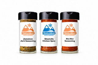 Trail Blazers Gift Set with Jamaican Jerk Seasoning, Ghostville Chicken Spice, Piri-Piri Seasoning jars side by side